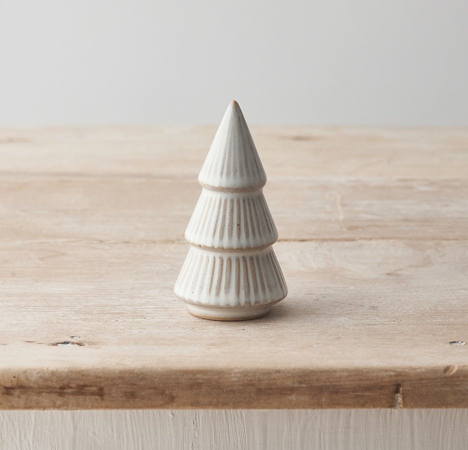 A charming ribbed tree with a raw edge and natural glaze.