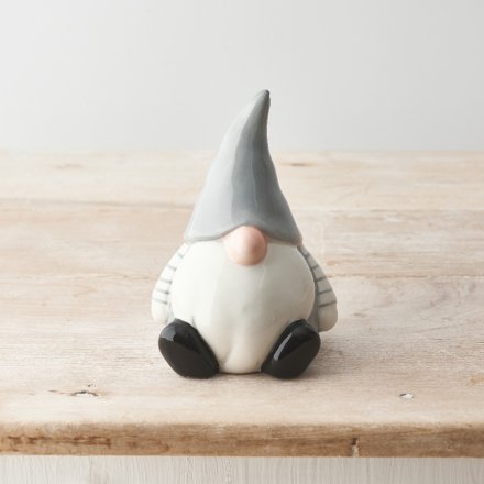 Welcome this adorable gonk ornament into the home this season. In neutral grey and white colours with a glossy finish. 