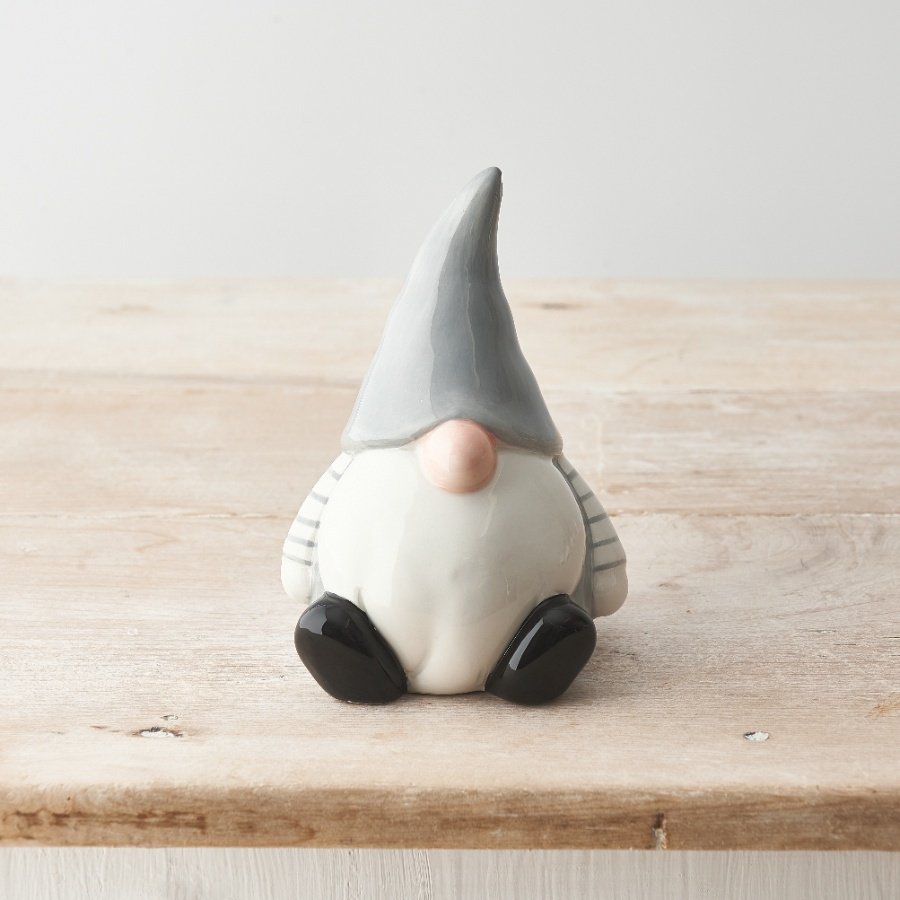 A charming gonk ornament with a grey pointed hat and striped detail. 