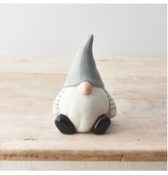 A cute ceramic gonk decoration in grey and white. A must have seasonal accessory for the neutral home. 