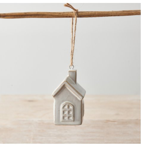 Hang on your tree or display as a stand alone piece. Beautifully crafted with cosy cottage details and natural glaze