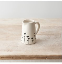 A charming jug with a beautiful floral design in black. 