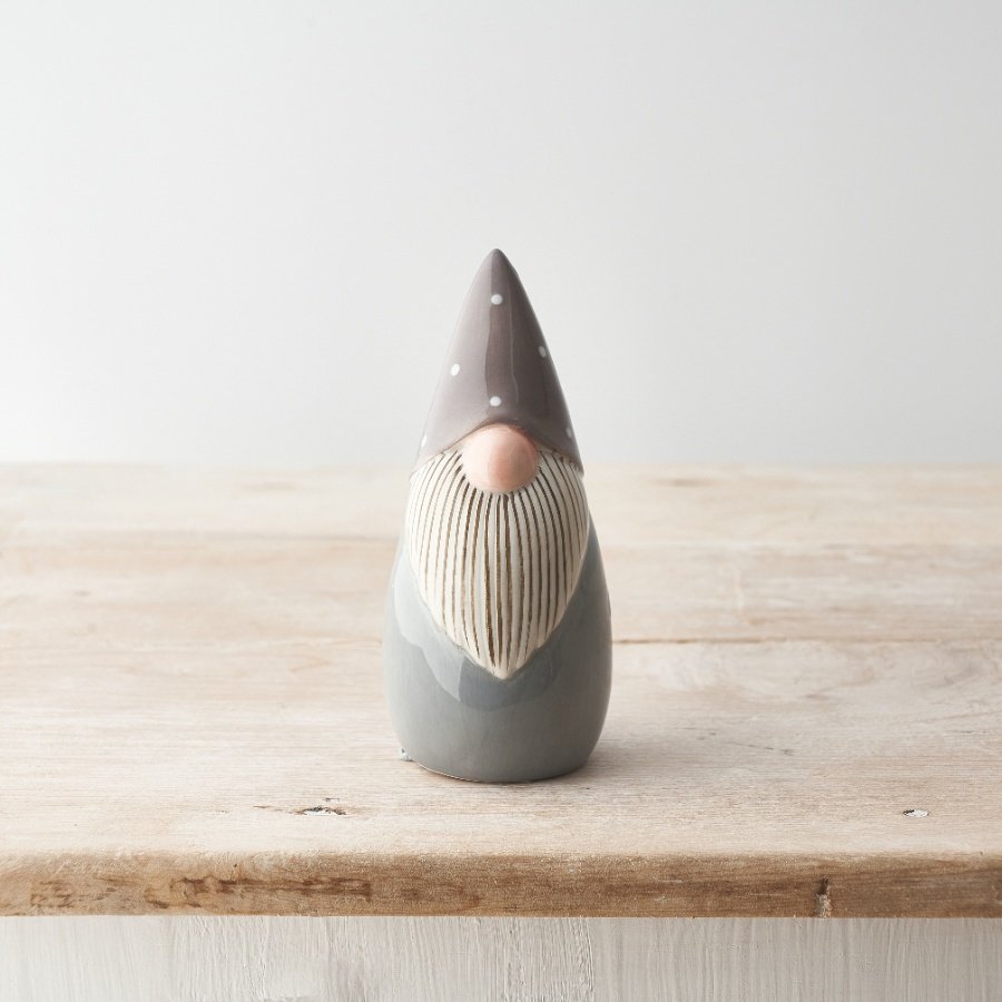 A chic and stylish ceramic gonk ornament with a polka dot hat and grey striped beard. 