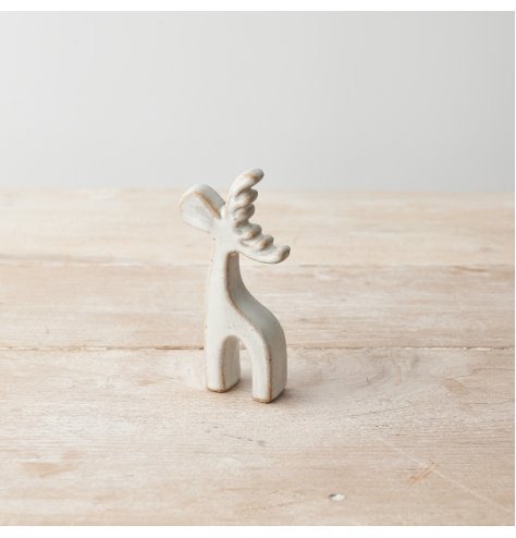 A stylish ceramic reindeer ornament with a rustic finish 