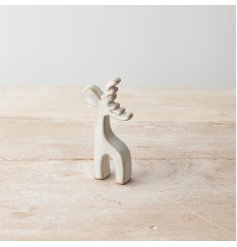 A stylish ceramic reindeer decoration with a rustic finish 