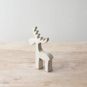 A contemporary ceramic reindeer ornament with a natural glazed finish. 
