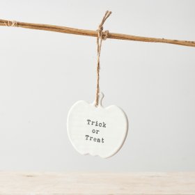A chic and unique pumpkin shaped ceramic decoration with a stamped Trick or Treat slogan. 