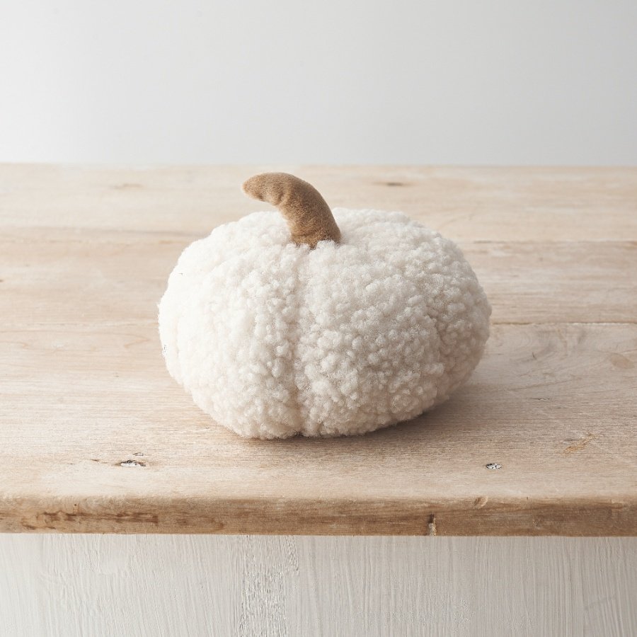 An adorable decorative pumpkin in a stylish sherpa material, with contrasting coloured stalk. 