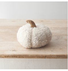 A super sweet pumpkin decoration is a stylish sherpa fabric with contrasting stalk design. 