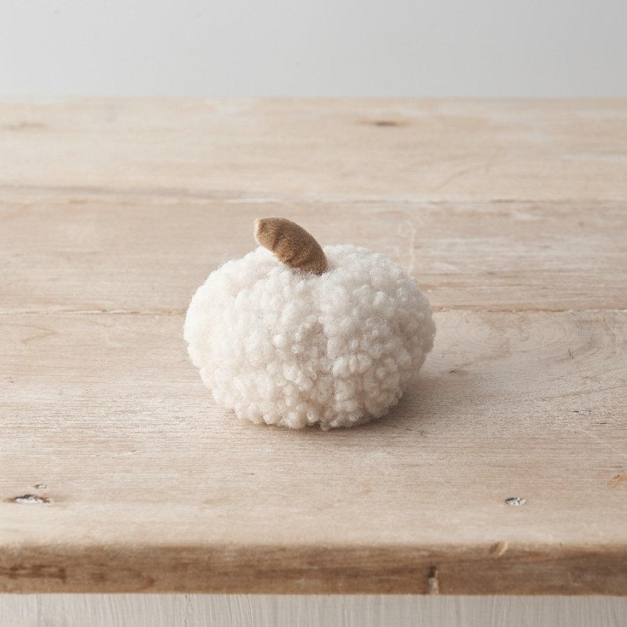 An adorable little pumpkin in a stylish sherpa material, with contrasting coloured stalk. 