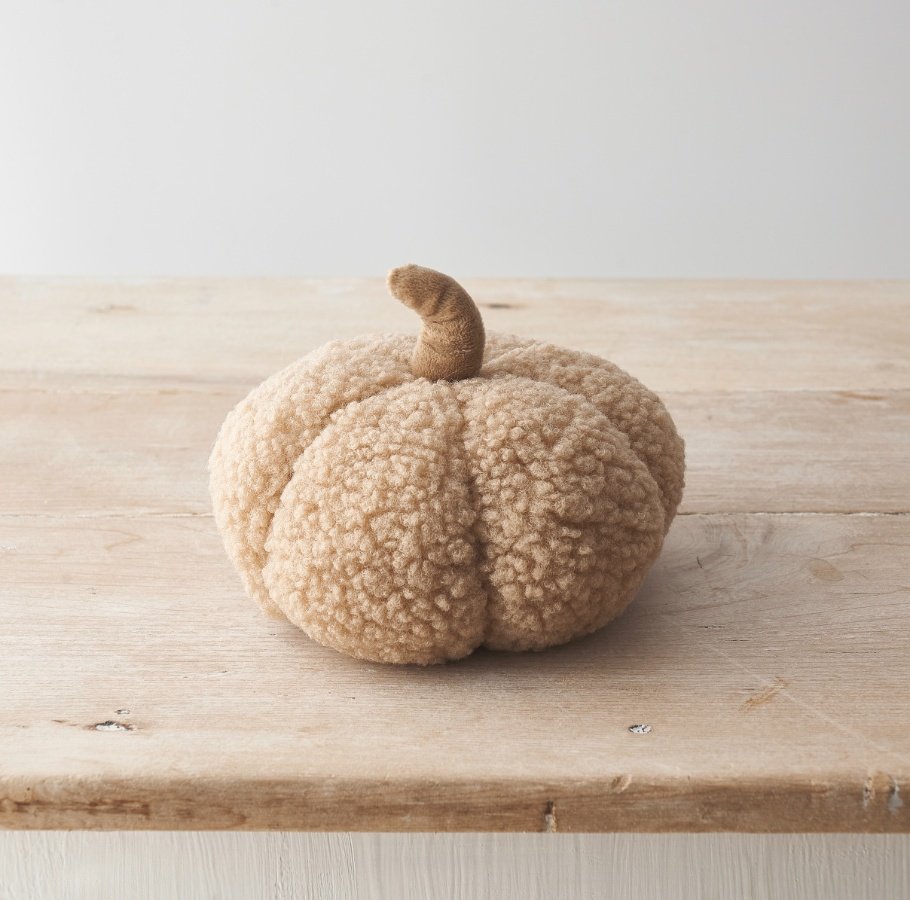 A stylish sherpa material pumpkin decoration in a natural colour scheme. 