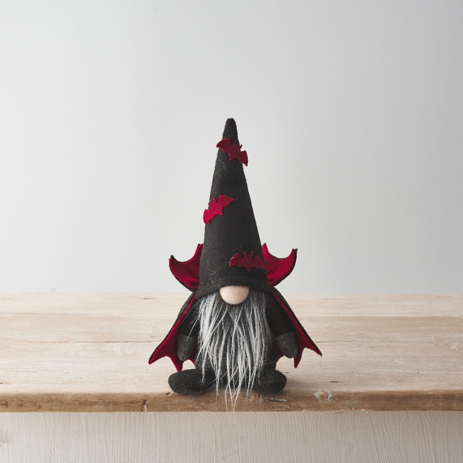 A stylish fabric gonk decoration with a classic grey and white beard, button nose and pointed hat. 