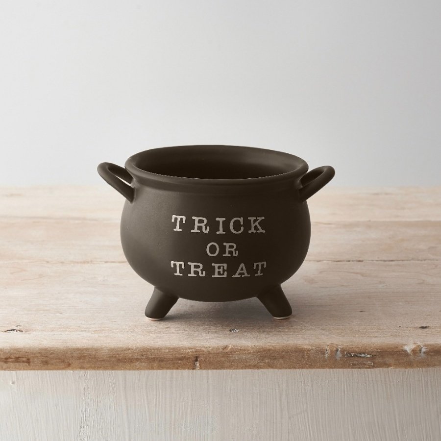 TRICK OR TREAT! A unique cauldron shaped pot with a seasonal slogan. 