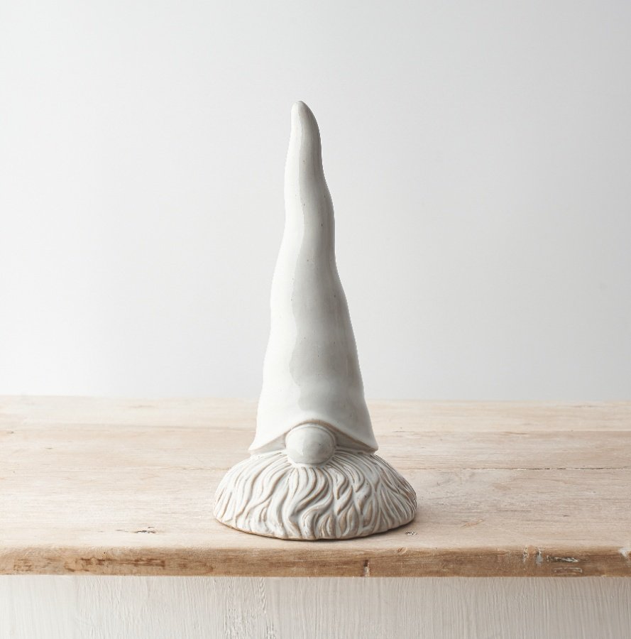 A stylish ceramic gonk ornament. Beautifully detailed with a natural glaze. A scandi inspired ornament with a rough luxe