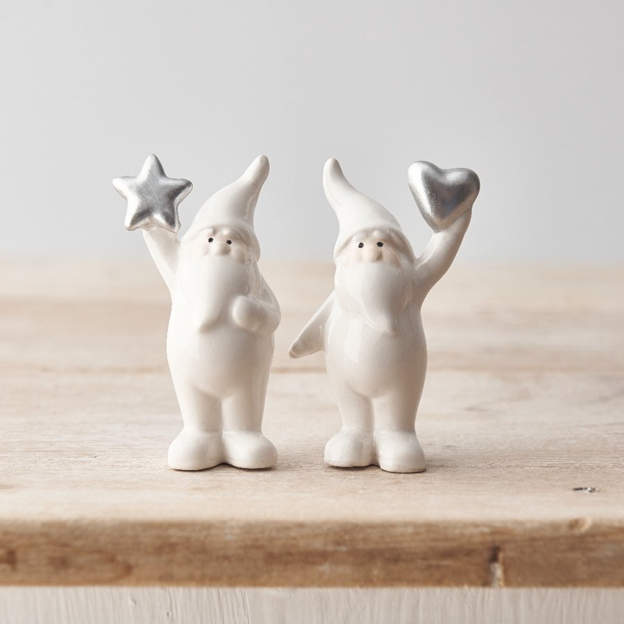 Fall in love with these charming ceramic Santa ornaments, each with a silver star or heart.