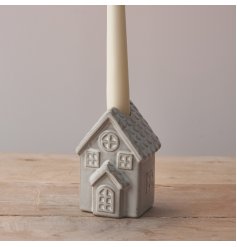 A charming candlestick holder with a natural glaze and rustic finish. A unique and beautifully detailed gift.