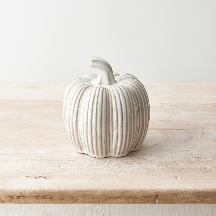 A stylish ceramic pumpkin ornament with a natural glaze. 