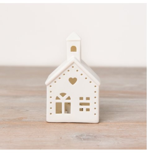 A stylish ceramic church decoration with cut out design to show off the light up features and sweet heart detail. 