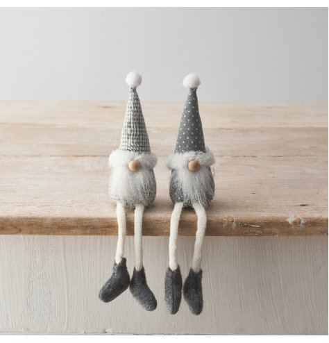 2 Assorted gonk decorations featuring long dangly legs, fluffy beards and patterned grey fabric. 