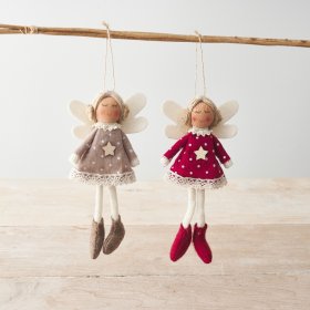 2 Assorted hanging knitted fairy decorations each with pretty polka dot pattern dresses with star motif. 