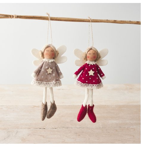 2 Assorted knitted fairy hanging decorations, each with cute felt wings and polka dot pattern dresses. 