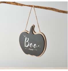 A stylish and unique seasonal sign in the shape of a pumpkin. Decorated with a charming boo crew slogan.