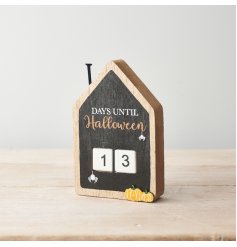 Countdown the days until Halloween with this rustic wooden house plaque.