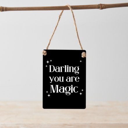 A mini metal hanging sign with "darling you are magic" message and bold monochrome design. 