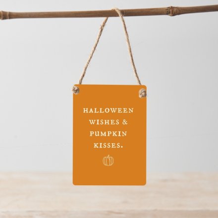 A charming mini metal sign with a Halloween wishes slogan. Complete with rustic jute string for hanging.