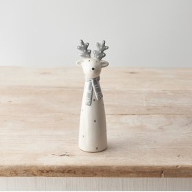 A chic ceramic reindeer ornament in grey and white colours. A neutral decoration to compliment interiors this season.