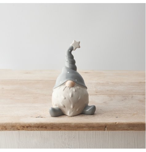 A chic ceramic gonk ornament in grey and white colours. A must have seasonal gift item and decoration.