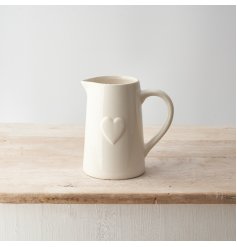 A timeless ceramic jug with an embossed heart. Perfect for displaying your favourite blooms. 