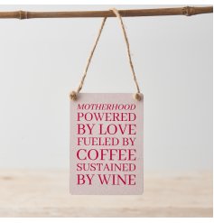 A pretty pink mini metal sign with humorous message about Motherhood in a bold red text. 