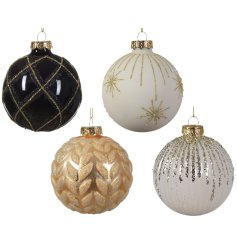 A mix of 4 glass baubles each featuring a different gold pattern. 