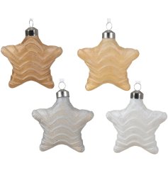 An assortment of 4 champagne, gold, silver and white glass baubles. Each has a stylish wave pattern and ribbon hanger.