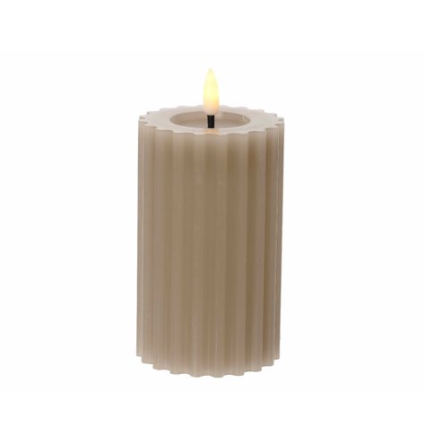 A stylish greige coloured wax candle with a ribbed surface texture and dipped melted centre. Complete with LED wick. 