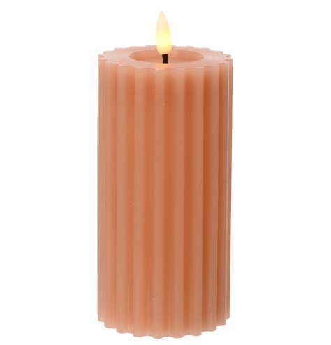 An authentic artificial candle with a wax surface and dipped wick centre. Complete with a warm glow LED flame. 