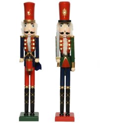 An assortment of 2 large wooden nutcrackers, painted in traditional festive colours. 