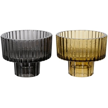 A mix of 2 chic glass candle holders in transparent gold and black colours. Stylish with a ribbed detail. 