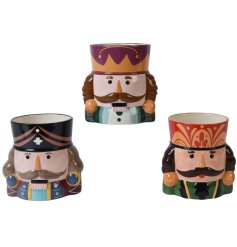 A mix of 3 colourful and unique planters in nutcracker designs. A unique gift item and homeware item. 