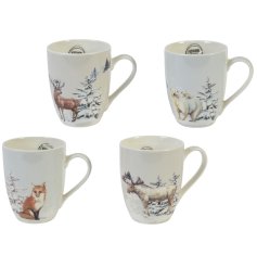A mix of 4 white porcelain mugs each with a snowy mountain decal featuring a fox, deer, moose or polar bear.