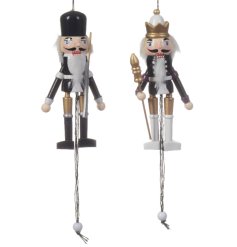 A mix of 2 wooden nutcrackers in monochrome colours. 