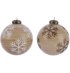 An assortment of 2 glass baubles each with a wooden decal and snowflake design in white and bronze glitter finishes. 