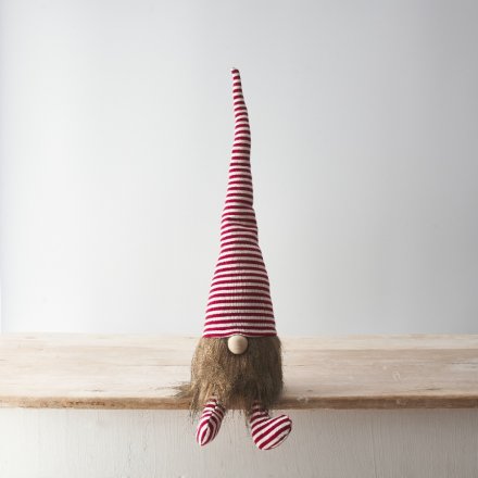 A fantastic festive gonk decoration in candy cane stripes with a faux fur beard and cute button nose.