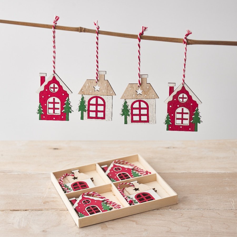 A set of 8 wooden house hanging decorations each with a festive design, cut out details and striped hanger. 