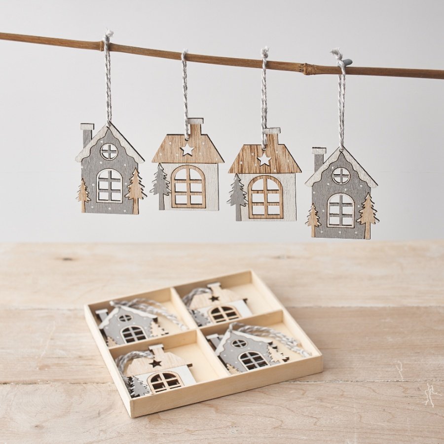 A set of 8 wooden house hanging decorations each with a festive design, cut out details and striped hanger. 