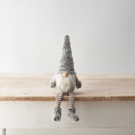 A sweet gonk decoration with striped leg design, grey faux fur details and fluffy beard. 