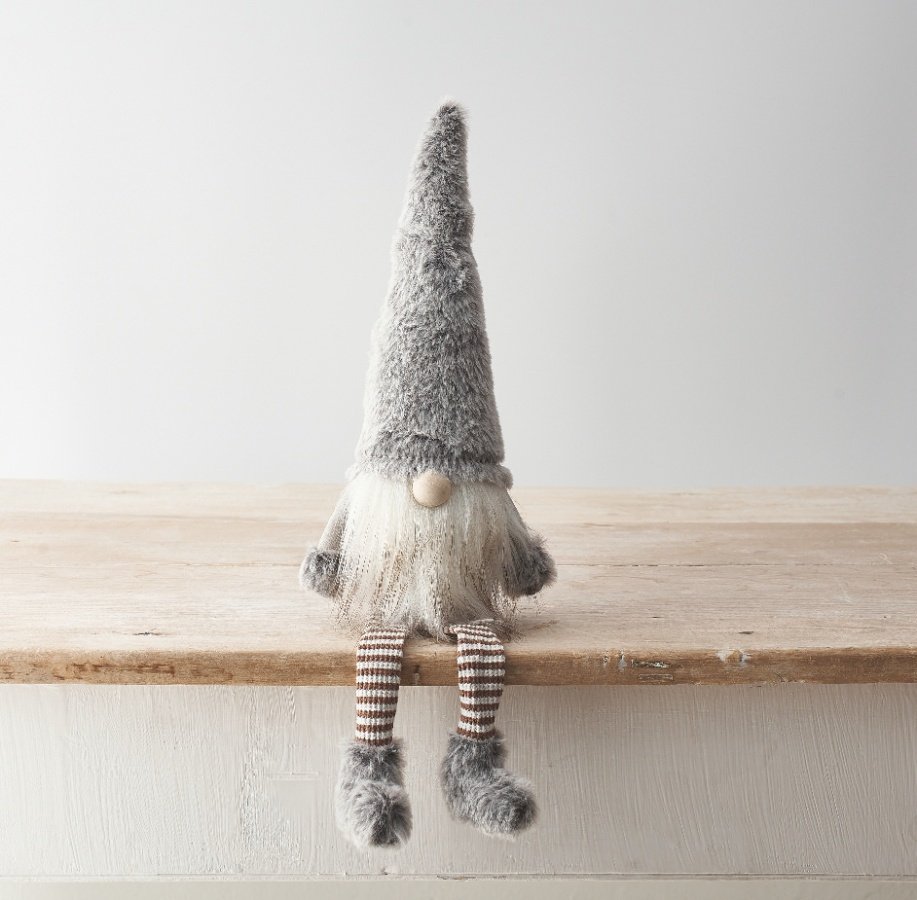 A charming gonk decoration with grey faux fur fabric details, striped leg design and fluffy beard. 