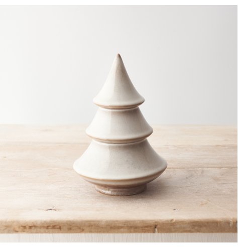 A stylish and chic Christmas tree ornament with a layered style and natural glazed finish. 