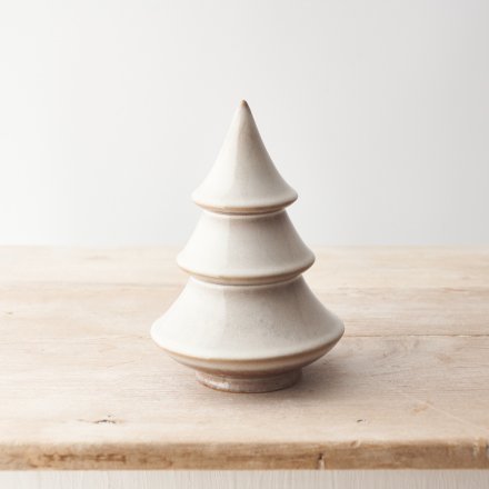 A contemporary glazed Christmas tree ornament with a glossy finish.